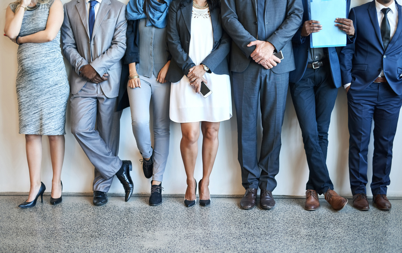 business people waiting in line